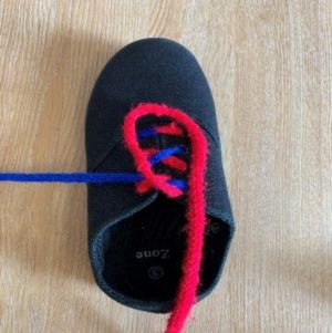 How to tie shoe laces using the bunny ears method - Buckinghamshire ...